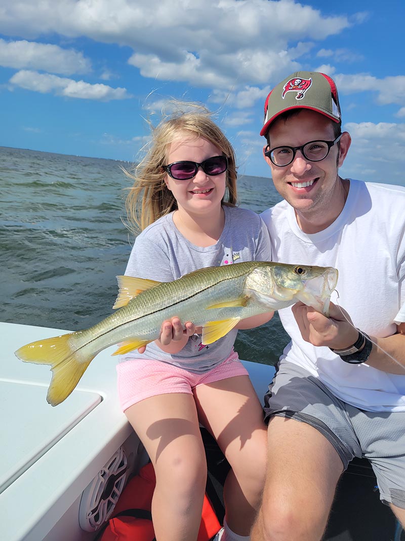 family fishing indoors